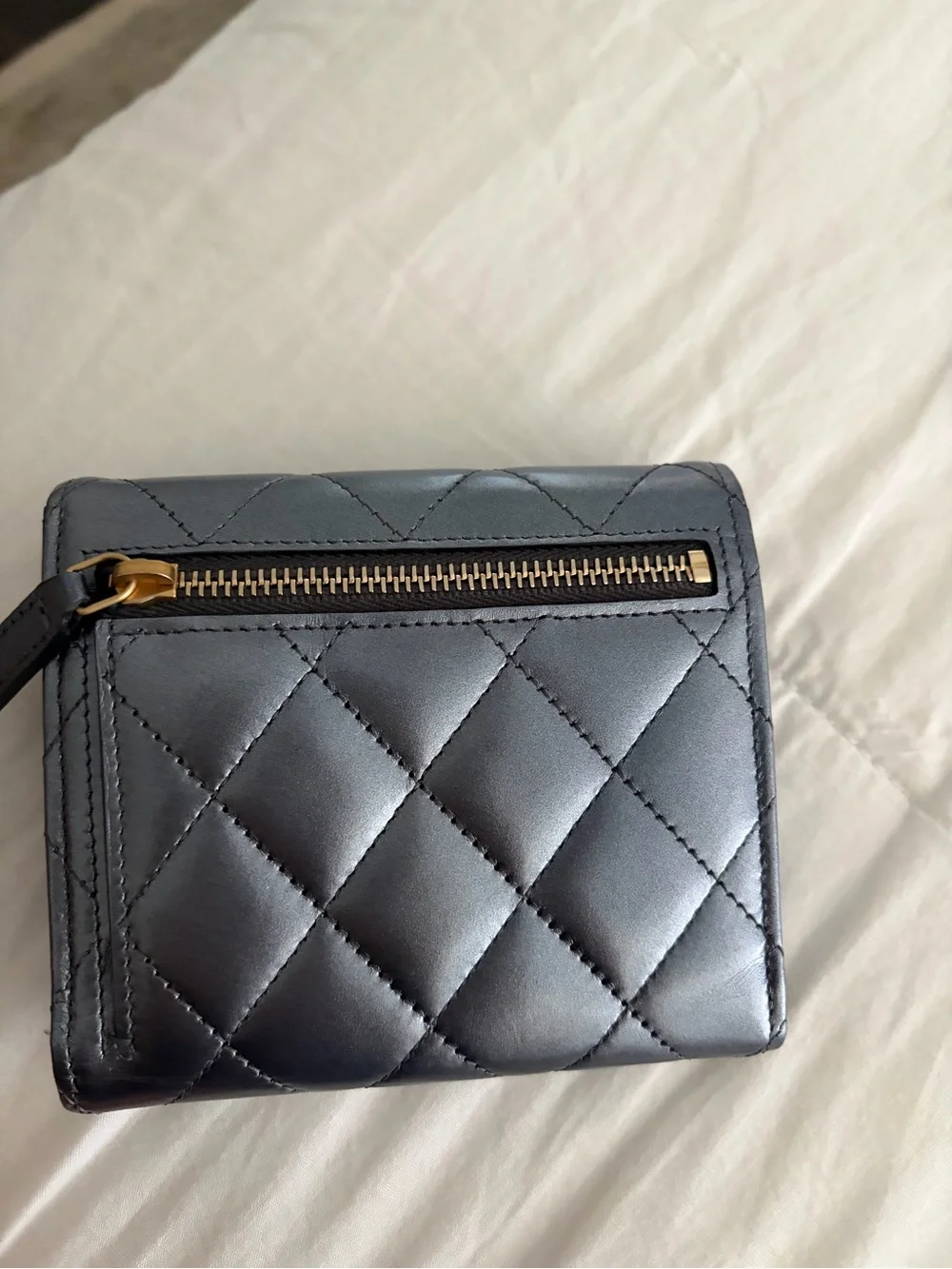 CHANEL Black Quilted Leather Wallet with Gold CC Emblem